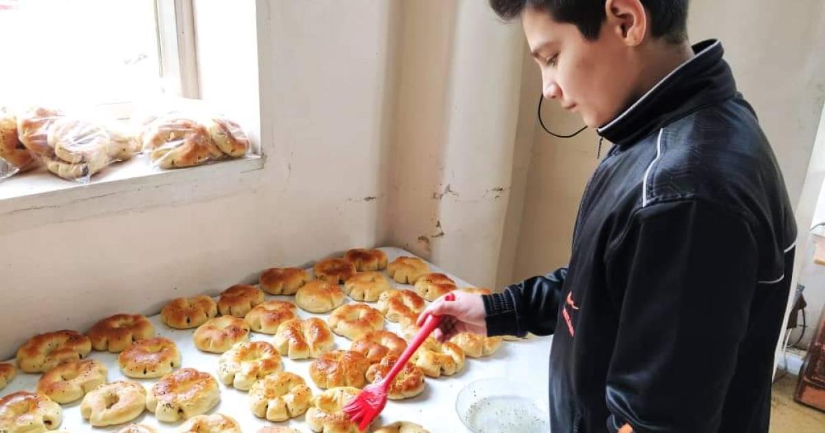 Yamen (13) from Syria celebrates Eid-Al-Fitr